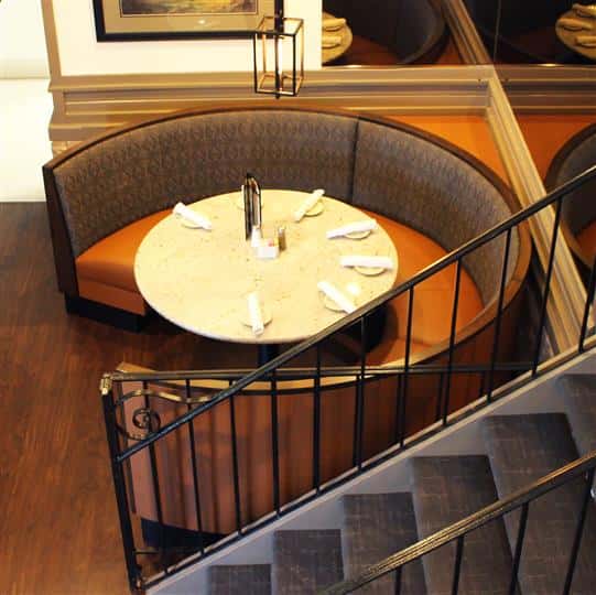 Circular dining table