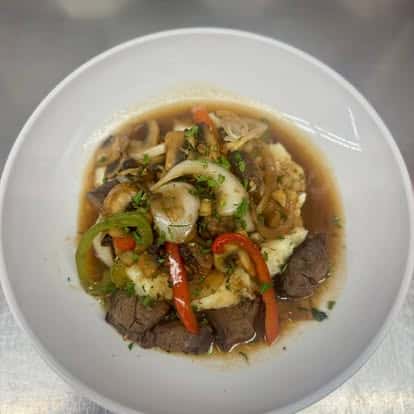 BEEF TIPS OVER MASHED