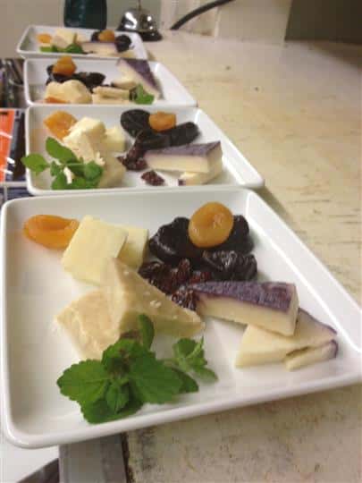 Cheese and raisins on a platter