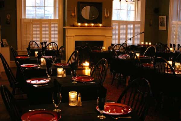 Dining area with fire place in the background