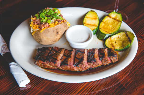 flank steak with baked potato