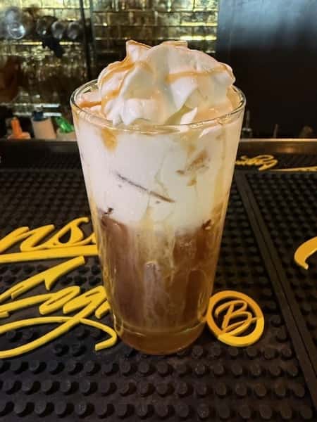Iced Coffee With Whipped Cream And Caramel Drizzle
