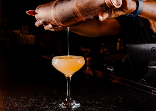 Bartender pouring drink