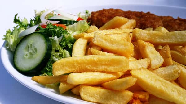 golden-fish-and-chips-served-with-a-fresh-cucumber-and-lettuce