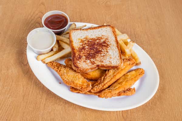 Breaded chicken strips, fries and toast with two dipping sauces on an oval plate.