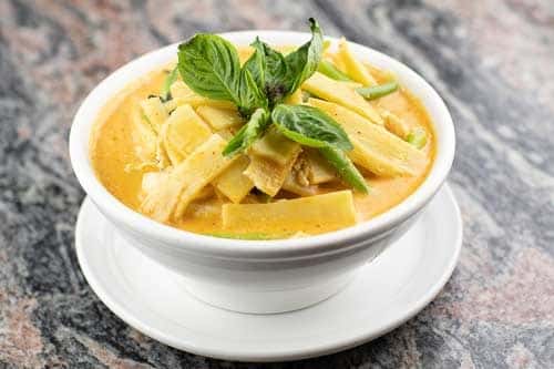 Red curry with coconut milk, bamboo shoots, Green beans, Thai eggplant, & basil with your choice of meat.