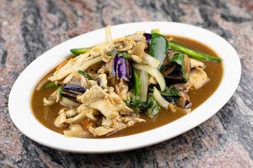 Japanese eggplant stir-fried with onions, carrots, mushrooms, & Basil with your choice of meat.