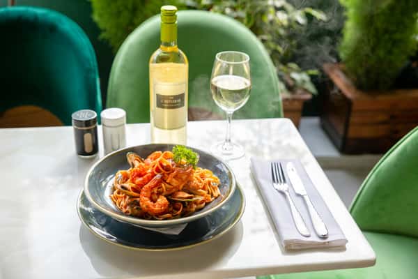 seafood pasta and wine