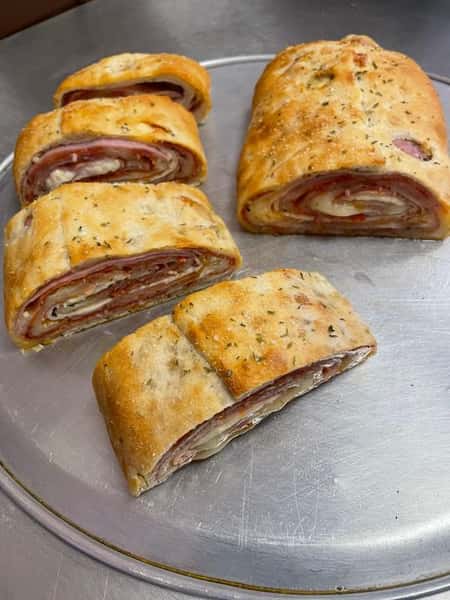 True Philly-style sromboli with Capicola, Salami, Ham, Pepperoni and Provolone served with a large side of savory marinara and homemade Italian dressing. Order it as is, or customize to your liking.