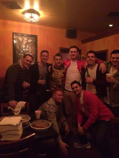 a group of guys posing together