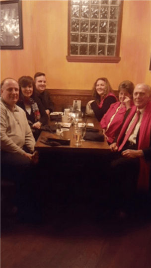 a table of 6 happy customers