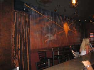 painting of a seagull flying on the wall of the restaurant