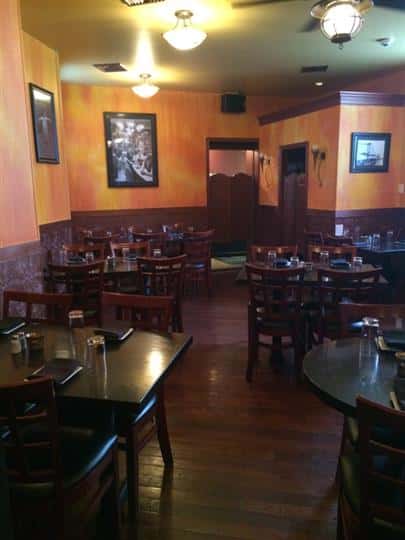 empty seating area showing four seats per table