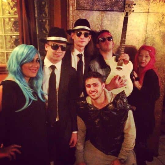 six customers dressed up for halloween