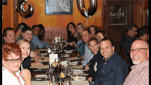 a group of friends celebrating a 30th birthday