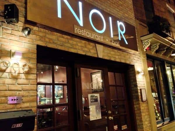 the storefront of noir restaurant and bar