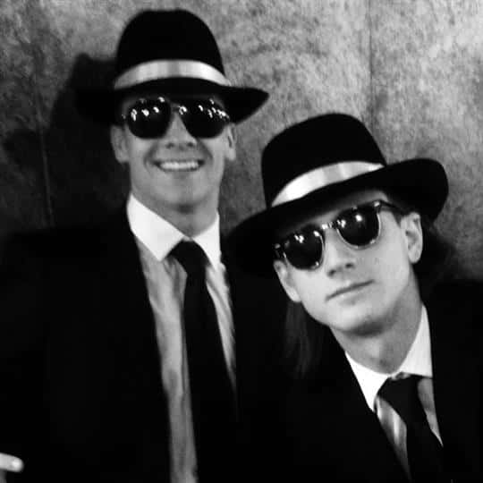 two customers dressed as the characters from men in black