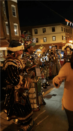 renaissance people outside the restaurant in the street