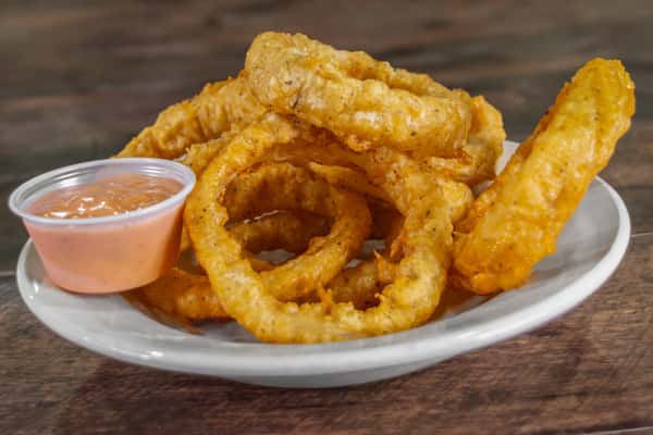 Crispy battered onion rings paired with a creamy orange dipping sauce, showcasing a popular appetizer option at Cherry Pocket.