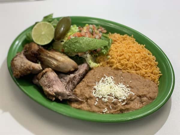 Guilotas: Fried whole quail with roasted tomatillo sauce, rice and beans.