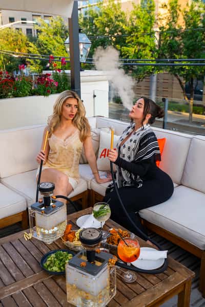 Guests enjoying quality time in The Kennedy's elegant lounge with distinctive ambiance