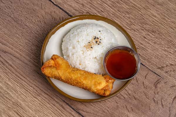 Spring roll served with steamed white rice topped with sesame seeds and a side of dipping sauce.