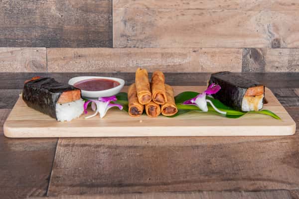 Hawaiian appetizer spread at Kalei's Kitchenette San Diego, including pork lumpia and daikon musubi