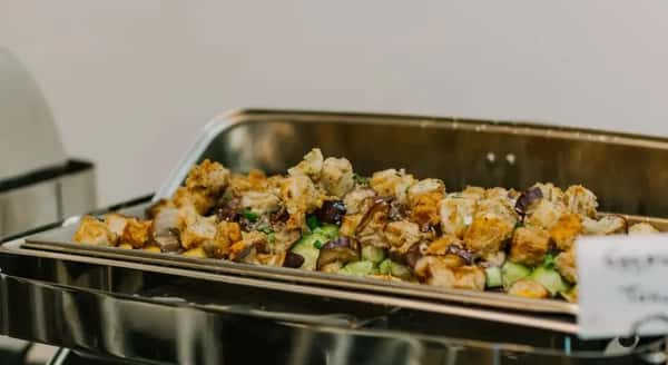 A chafing dish filled with food