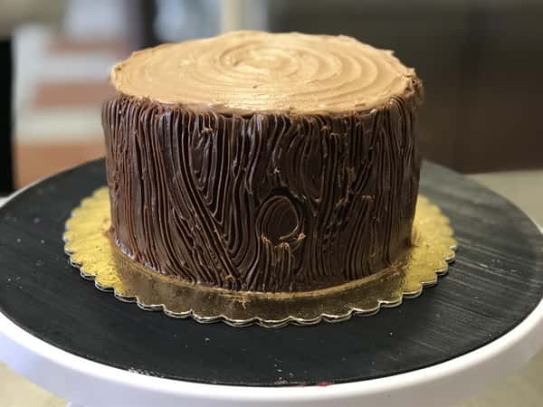 a cake shaped like a log of wood