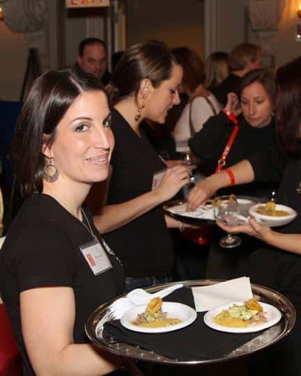 wait staff preparing food for an event