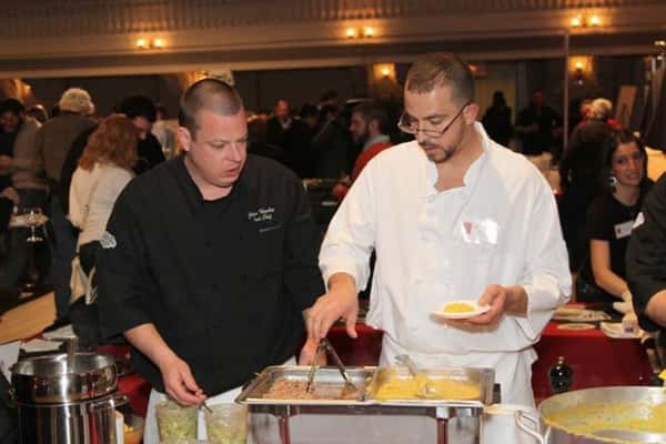 wait staff preparing food for an event