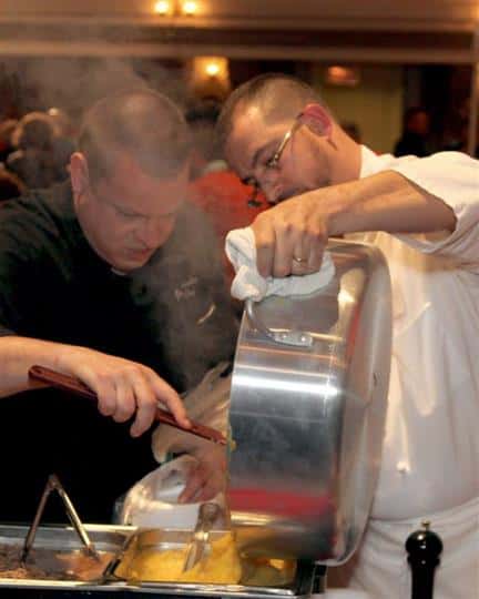 wait staff preparing food for an event
