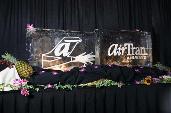 "AirTran Airways" logos carved into two ice blocks
