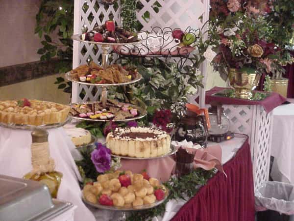 a dessert spread with various pastries