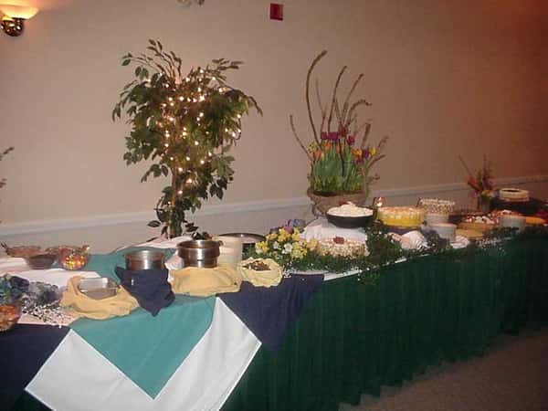 buffet table with various food dishes