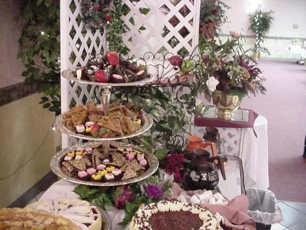 a dessert spread with various pastries