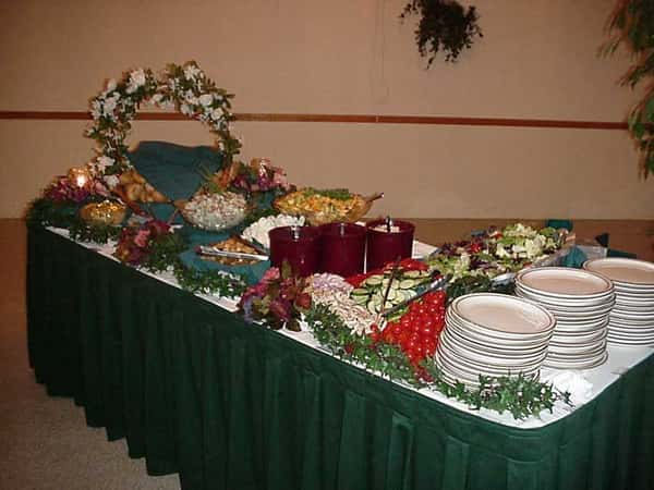 buffet table with various salads