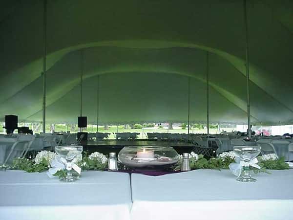 a table with candles and floral decorations