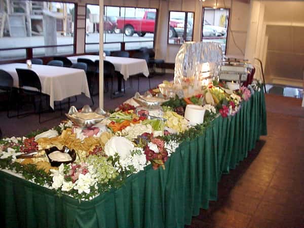 buffet table with various food dishes