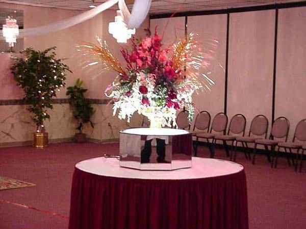 a table with a floral centerpiece