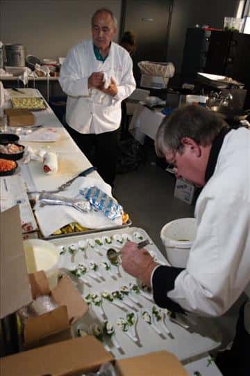 a chef decoratively preparing food