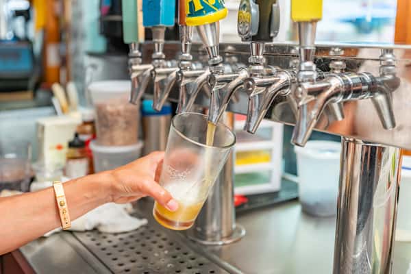 pouring beer from tap