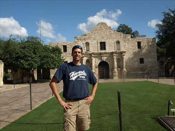 Todd Lensing at the Alamo, San Antonio, Texas wearing Howard's Pub t-shirt