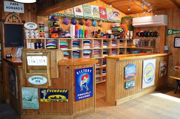Howard's Pub gift shop with hats, t-shirts, cups.