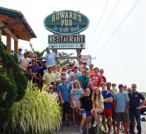 Howard's Staff in front of outdoor sign