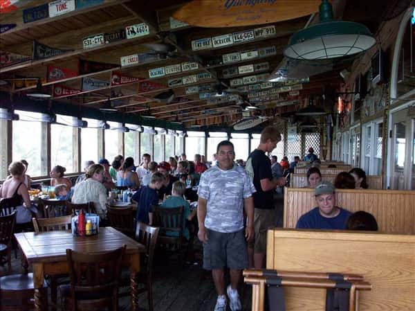 Patrons dining on patio at Howard's Pub