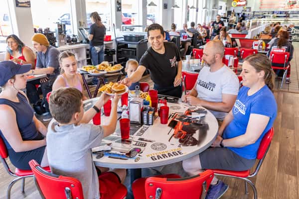 Table being served burgers