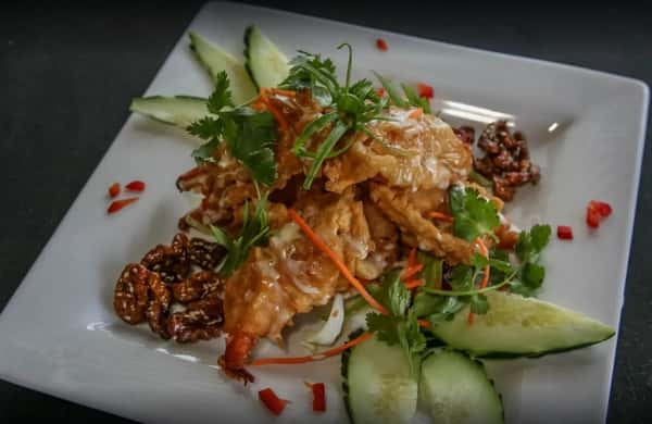 (42) Honey Walnut Prawns - Our signature dish. Crisp, lightly battered, jumbo prawns covered in an elegant, honey cream sauce and our homemade caramelized walnuts.