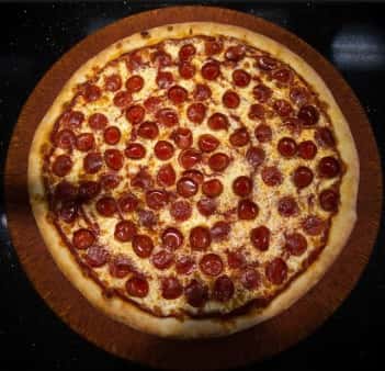 classic pepperoni pizza with crispy edges and evenly melted cheese