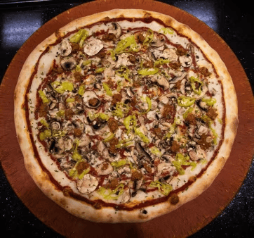 mushroom and pepper pizza with sautéed mushrooms, green peppers, and melted cheese on thin crust